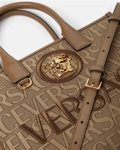 are versace small bags made with different logo|versace factory outlet.